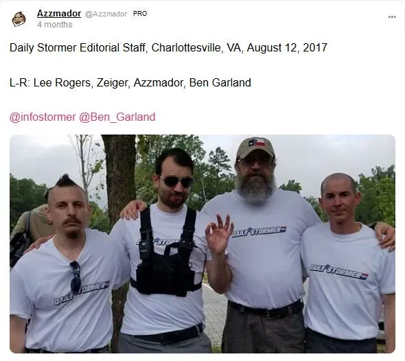 Screenshot of a Gab post from the account of Robert Warren Ray (alias Azzmador) featuring a group photo of “The Daily Stormer” editorial staff: Lee Rogers, Gabriel Sohier-Chaput, Robert Warren Ray, and Benjamin Garland at the “Unite the Right” rally in Charlottesville, Virginia 2017.